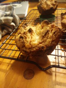 A well cooked kouign-amann, on the slightly too dark side of done.